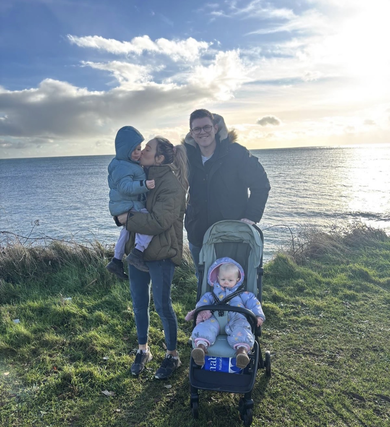 Chrissie with her family on a coastal walk